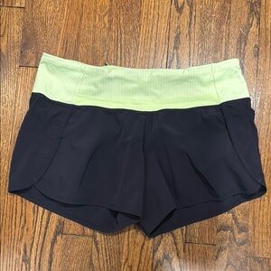 Women's Black and Green Shorts- Lululemon size 6